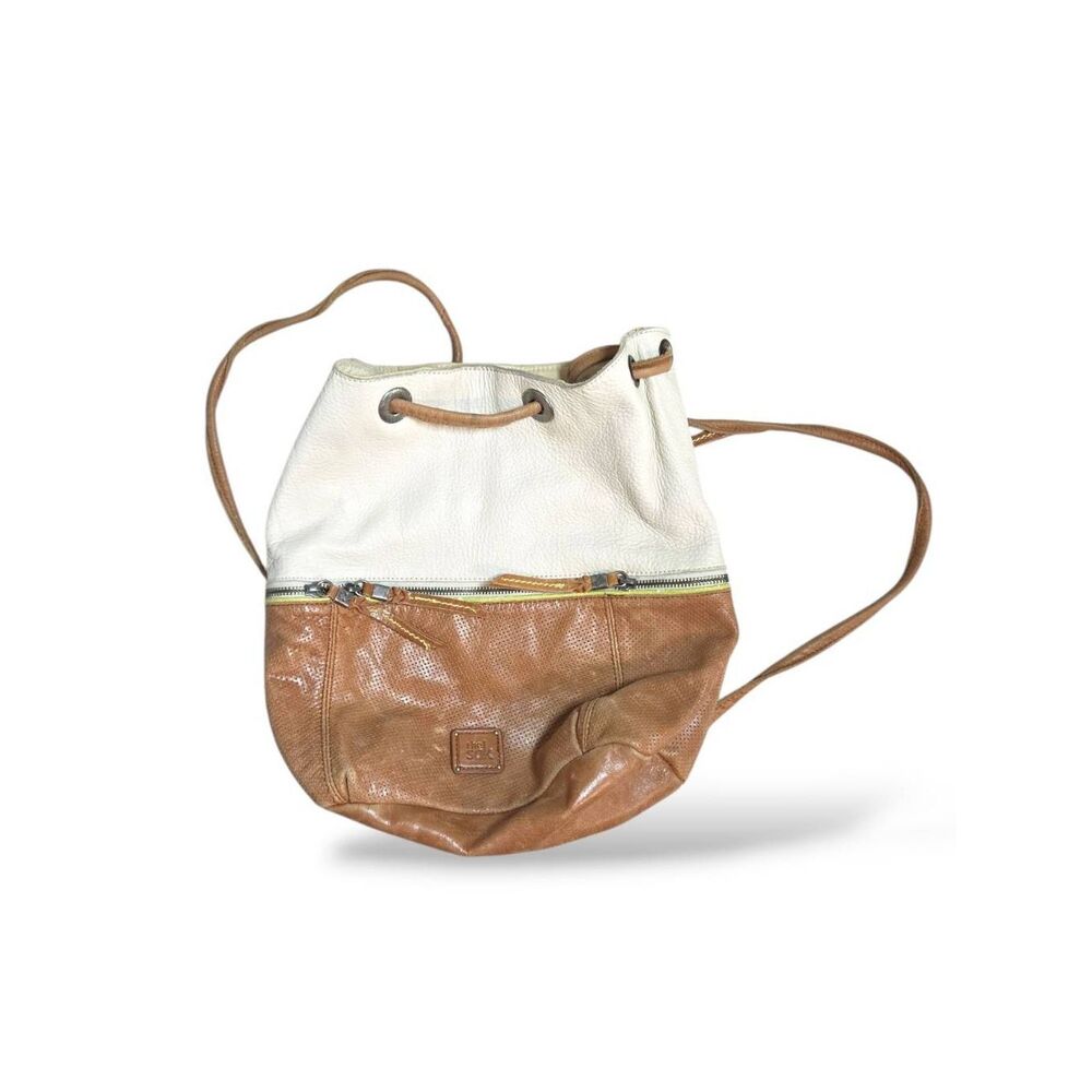 The Sak Two-Tone White and Cognac Brown Leather Drawstring Shoulder Bag